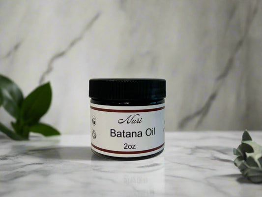 Jar of Nuri Batana Oil on a white background